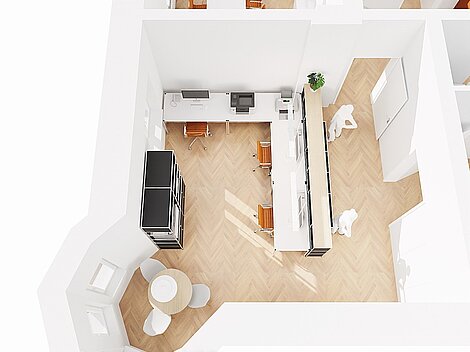Moderne Büroumgebung mit Schreibtischen, Stühlen und Pflanze auf hellem Holzboden